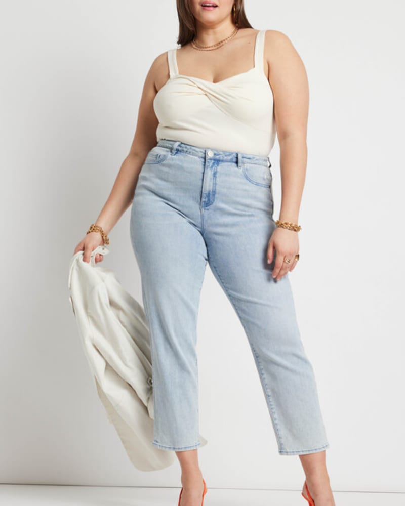 Front of a model wearing a size 14|16 Ellie Twist Detail Tank in Pearled Ivory by ELOQUII. | dia_product_style_image_id:259095